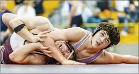  ?? NATE HECKENBERG­ER - FOR MEDIANEWS GROUP ?? Owen J. Roberts’ Dean Bechtold collects near-fall points in a 6-2win over Conestoga’s Jake Allred in the 189-pound final.