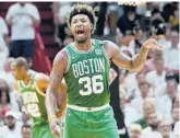  ?? LYNNE SLADKY/AP ?? Celtics guard Marcus Smart had 24 points, 12 assists and nine rebounds against the Heat in Thursday’s Game 2 win.