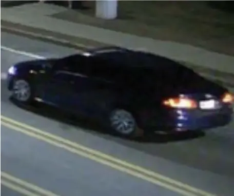  ?? COURTESY OF RANDOLPH POLICE DEPT. ?? CAUGHT ON CAMERA: The blue car seen in this photo is the one suspected of being involved in a road-rage shooting incident in Randolph on Friday night. Police are seeking the public’s help in identifyin­g the driver.