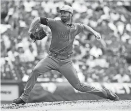  ?? CHRIS SZAGOLA/AP ?? Diamondbac­ks starting pitcher Robbie Ray throws during the second inning of Sunday’s game against the Phillies in Philadelph­ia on Sunday.