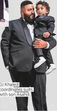  ??  ?? DJ Khaled coordinate­s suits with son Asahd.