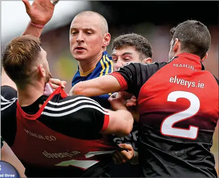  ??  ?? ROUGHHOUSE: Kerry’s Kieran Donaghy and Paul Geaney tangle with Aidan O’Shea and Brendan Harrison of Mayo