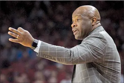  ?? NWA Democrat-Gazette/ANDY SHUPE ?? Coach Mike Anderson and the Arkansas men’s basketball team are 12-6 and 2-4 in the SEC after starting the season 11-2 and 1-0 in conference. But Anderson said the Hogs are still in the hunt to challenge for the league title. “We’re six games into...