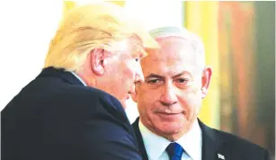  ?? (Brendan McDermid/Reuters) ?? WITH ONE gesture, Netanyahu, seen here with Donald Trump, could return the Palestinia­n cause to center-stage diplomatic­ally while sabotaging new Arab alliances.