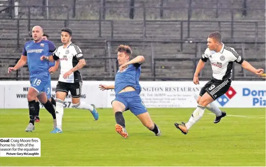  ??  ?? Goal Craig Moore fires home his 10th of the season for the equaliser
Picture: Gary McLaughlin