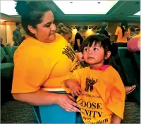  ?? MARY HUDETZ/ASSOCIATED PRESS ?? Two-year-old Amanda Ordonez and her babysitter, Veronica Velazquez, await the start of a hearing in Santa Fe, where lawmakers heard testimony about conditions inside federal detention facilities in the state.