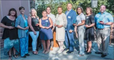  ??  ?? Receiving or accepting Hobart’s Run’s Pottstown Community Leaders Awards (among other recipients) are, from left: Amy Francis; Amy Wolf; Stephanie Sundermeir; Jennifer and Chuck Gulati; Rosina and William Ball; Hannah Davis (accepting an award on behalf of Johnny Corson); and Rocky Citrino.