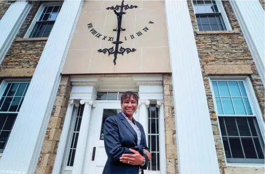  ?? EBONY COX / MILWAUKEE JOURNAL SENTINEL ?? Lawrence University President Laurie Carter, standing outside the Appleton school’s Main Hall, says, “From a first-gen perspectiv­e, education is hope. It gives you opportunit­ies. It gives you the chance to have the life that you dreamed of.”