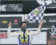  ?? TERRY RENNA — THE ASSOCIATED PRESS ?? Chase Elliott celebrates in Victory Lane after winning a NASCAR Cup Series auto race at Daytona Internatio­nal Speedway, Sunday, Aug. 16, 2020, in Daytona Beach, Fla.