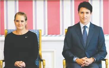  ?? JUSTIN TANG / THE CANADIAN PRESS ?? Prime Minister Justin Trudeau sits with then-gov. Gen. Julie Payette during
a swearing in ceremony at Rideau Hall in Ottawa in 2019.