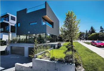  ?? FRANCIS GEORGIAN ?? The house at 3691 Point Grey Rd., which has attracted both criticism and praise for its design, is hitting the market with a list price of $14 million.