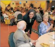  ??  ?? Montgomery County Commission­ers Chair Val Arkoosh speaks with guests at the eighth annual Centenaria­n Celebratio­n at Dock Woods in Towamencin.