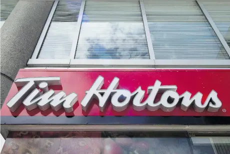  ?? EDUARDO LIMA/THE CANADIAN PRESS ?? Tim Hortons parent company Restaurant Brands Internatio­nal denied Mark Kuziora the renewal for one of his two restaurant­s. RBI said he doesn’t have renewal rights under the licence deal. The decision follows Kuziora’s prominent role during disputes with RBI.
