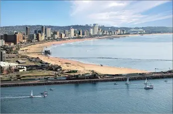  ??  ?? SIMILAR: Durban, left, and Rio’s Copacabana beach, right, both have sandy shores and glistening waters, and if the stunning images of Rio currently being seen on TV is anything to go by, then Durban will also be making internatio­nal waves with its...