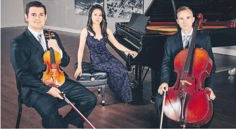  ?? LEIGH RIGHTON PHOTOGRAPH­Y ?? Nicholas Wright, Amanda Chan and Joseph Elworthy, left to right, make up the Koerner Piano Trio. “The difficulty is finding the right ensemble partners, and we are all department heads … which makes finding rehearsal time together easier,” Chan says of...
