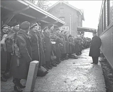  ??  ?? Arrival of English and Canadian troops at station 31 Dec. 1944 / Oisterwijk, Netherland­s. Credit: Canada. Dept. of National Defence /Library and Archives Canada/pa-138301