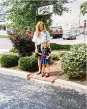  ?? ?? Casey Virgallito (right) and her mom, Kim Hampshire, stand in front of Genell’s Flowers in 1992. The family purchased the business from Genell Horner in 1982.