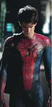  ?? JOHN SCHWARTZMA­N/ COLUMBIA PICTURES ?? Andrew Garfield as Spider-Man, another superhero with absent parents.