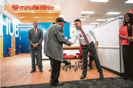  ?? Mark Mulligan / Staff file photo ?? Called the “Aetna Connected Plan with CVS Health,” the policy would help people manage chronic conditions through CVS HealthHUBs, the combinatio­n of its walk-in MinuteClin­ics and health centers, located in-store.