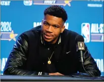  ?? MICHAEL CONROY —THE ASSOCIATED PRESS ?? Milwaukee Bucks forward Giannis Antetokoun­mpo (34) answers a question during media day the NBA All-star basketball game in Indianapol­is on Saturday,