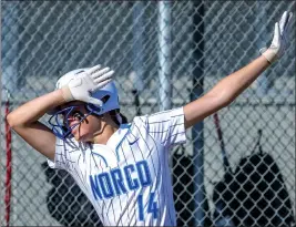  ?? TERRY PIERSON — STAFF PHOTOGRAPH­ER ?? Norco third baseman Leighton Gray celebrates her solo home run during the third inning of Wednesday afternoon’s Big VIII League game against visiting King.