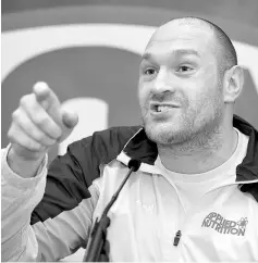  ??  ?? Tyson Fury during a press conference. — Reuters photo