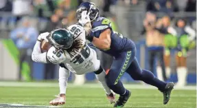  ??  ?? Bobby Wagner says of the Seahawks injuries: “Everybody wants to step up, including myself.” STEVEN BISIG/USA TODAY SPORTS