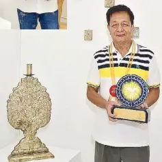  ??  ?? National Living Treasure awardee and Master Artist Eduardo Mutuc has dedicated his life to creating religious and secular art in intricatel­y detailed retablos, mirrors, altars and carozas.