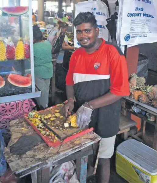  ?? Picture: BALJEET SINGH ?? Prashant Swamy at his fruit stall in the Lautoka Municipal Market.