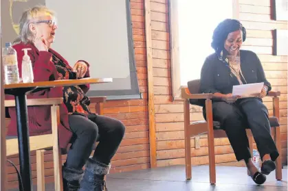  ?? LOGAN MACLEAN • THE GUARDIAN ?? Linda Hennessey, left, tells Kendi Tarichia some of the stories she has found about Black Islanders and their descendant­s. The two spoke onstage at Beaconsfie­ld’s Carriage House during a recent Black History Month event.