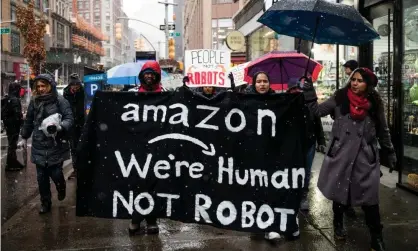  ??  ?? ‘Amazon is putting cameras in the trucks of its delivery drivers, monitors on the bodies of its warehouse workers, and security cameras both inside and outside its facilities.’ Photograph: Bloomberg/Getty Images