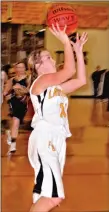  ?? BEN MADRID ENTERPRISE-LEADER ?? Taylor Hartin goes strong to the basket against Charleston. After losing 74-50 at 7A perennial power Fort Smith Northside on Nov. 18, the Prairie Grove girls rebounded to defeat Charleston 72-36 on Thursday.