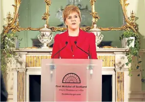  ??  ?? First Minister Nicoa Sturgeon declares her intention to hold a second referendum on Scottish independen­ce during a speech at Bute House.