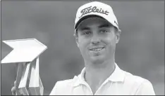  ?? AP/JOSHUA PAUL ?? Justin Thomas earned his first PGA Tour victory Sunday as he starts his second full year on tour, but there were those on tour and in the media who thought it would’ve happened sooner.