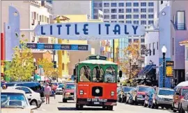  ?? Joanne DiBona
SanDiego.org ?? THE OLD TOWN TROLLEY makes its way through San Diego’s Little Italy.