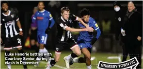  ??  ?? Luke Hendrie battles with Courtney Senior during the clash in December