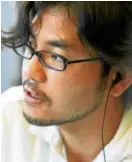  ??  ?? Norihiro Koizumi (right) writes and directs the three films based on Yuki Suetsugu’s popular manga about a young competitiv­e “karuta” player.
