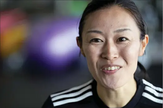  ?? EUGENE HOSHIKO — THE ASSOCIATED PRESS ?? Yoshimi Yamashita, one of three women picked to be head referees at the men’s soccer World Cup, speaks during an interview with The Associated Press on Monday.