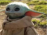  ??  ?? Brilliant he is: Baby Yoda is one of the stars of Disney’s space epic The Mandaloria­n