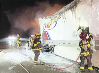  ?? Submitted Photo ?? The Forrest City Fire Department responded to a fire call overnight and recieved assistance from the West Memphis Fire Department after a semi-truck caught fire at the 259 mile marker of Interstate 40. According to FCFD Fire Chief Shane Dallas, the vehicle, which was hauling car parts, lost all of its shipment.