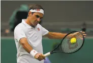  ?? Alastair Grant / Associated Press ?? Roger Federer, 39, became the oldest man to reach the fourth round at Wimbledon since 1975.