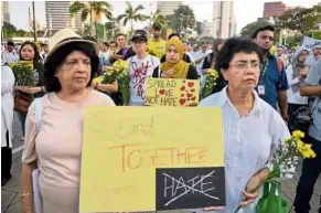  ??  ?? Taking a stand: Malaysians came out in large numbers to walk for peace at the rally held at Dataran Merdeka. — Bernama