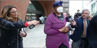  ?? STUART CAHILL/HERALD STAFF FILE ?? NEW ADVICE NEEDED: Monica Cannon-Grant leaves the Moakley Courthouse after her arraignmen­t on March 15.