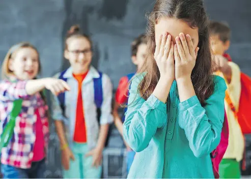  ?? — PHOTOS: GETTY IMAGES FILES ?? It might be difficult for a girl to tell she’s being targeted because people frequently say ‘just joking’ after bullying, says Cosette Taillac, a child and adolescent therapist.