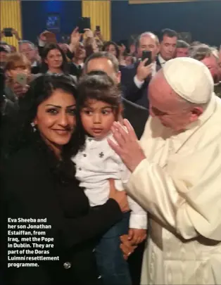  ??  ?? Eva Sheeba and her son Jonathan Estaiffan, from
Iraq, met the Pope in Dublin. They are part of the Doras Luimní resettleme­nt programme.