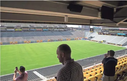  ?? MARK HENLE/THE REPUBLIC ?? The view from the Coach’s Club lounge box on Friday during a media tour of ASU's New West Side Club at Sun Devil Stadium. The new club-level seating is part of the phased reconstruc­tion of the stadium.