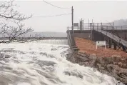  ?? Patrick Sikes/For Hearst Connecticu­t Media ?? Waters at the Samuel P. Senior Dam in Weston Saturday morning.