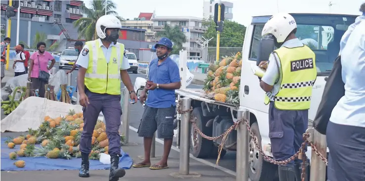  ?? Photo: Ronald Kumar ?? Police traffic officers patrolling the streets of the capital city during the festive session.