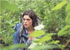  ?? LIONSGATE ?? Do they never learn? Callie Hernandez heads into the woods.
