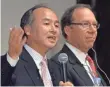  ??  ?? Masayoshi Son and Sprint Nextel CEO Dan Hesse talk of Softbank’s acquisitio­n. YOSHIKAZU TSUNO, AFP/GETTY IMAGES